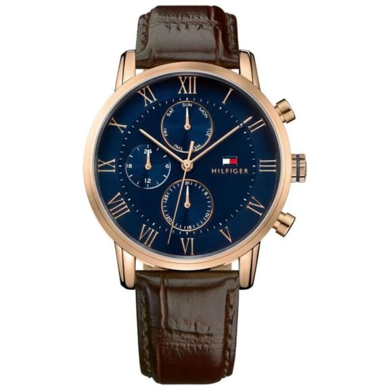 Tommy Hilfiger wristwatch with a blue face, gold accents, and brown leather band