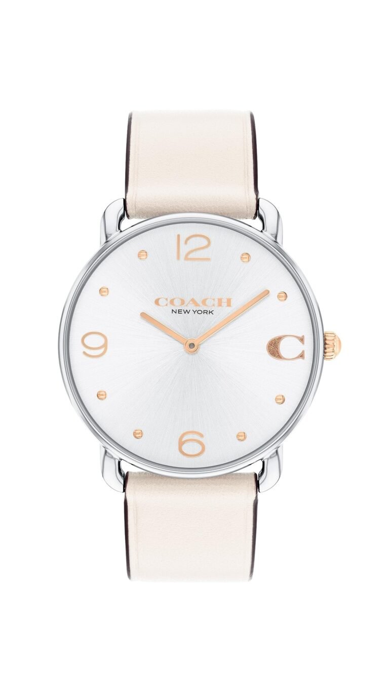 Coach watch with a silver face, gold accents, and cream leather band
