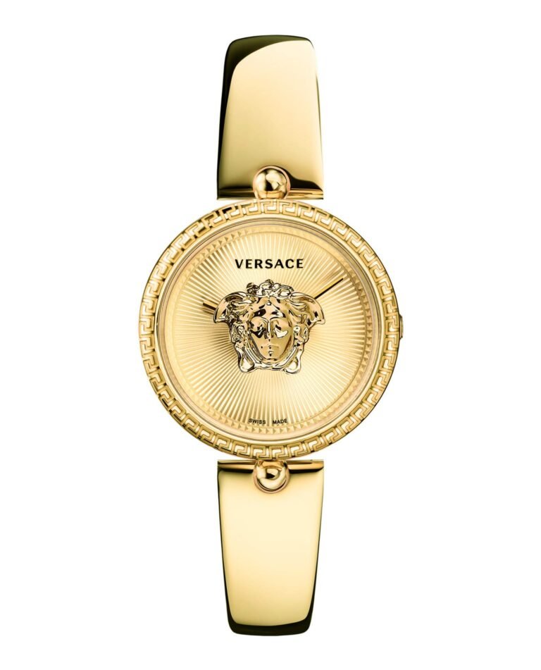 Gold Versace watch with Medusa head logo on a radial patterned face