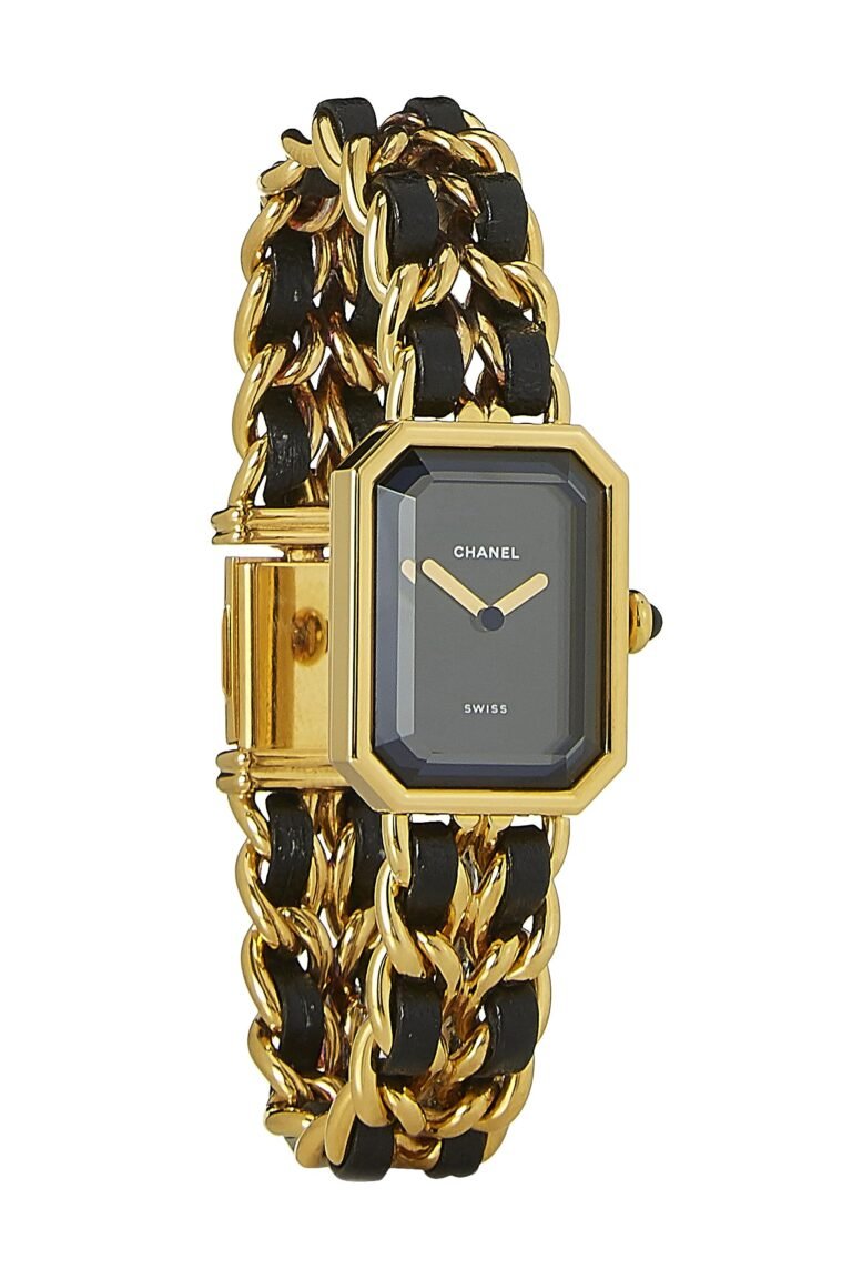 Chanel gold watch with black leather chain-link band and dark face